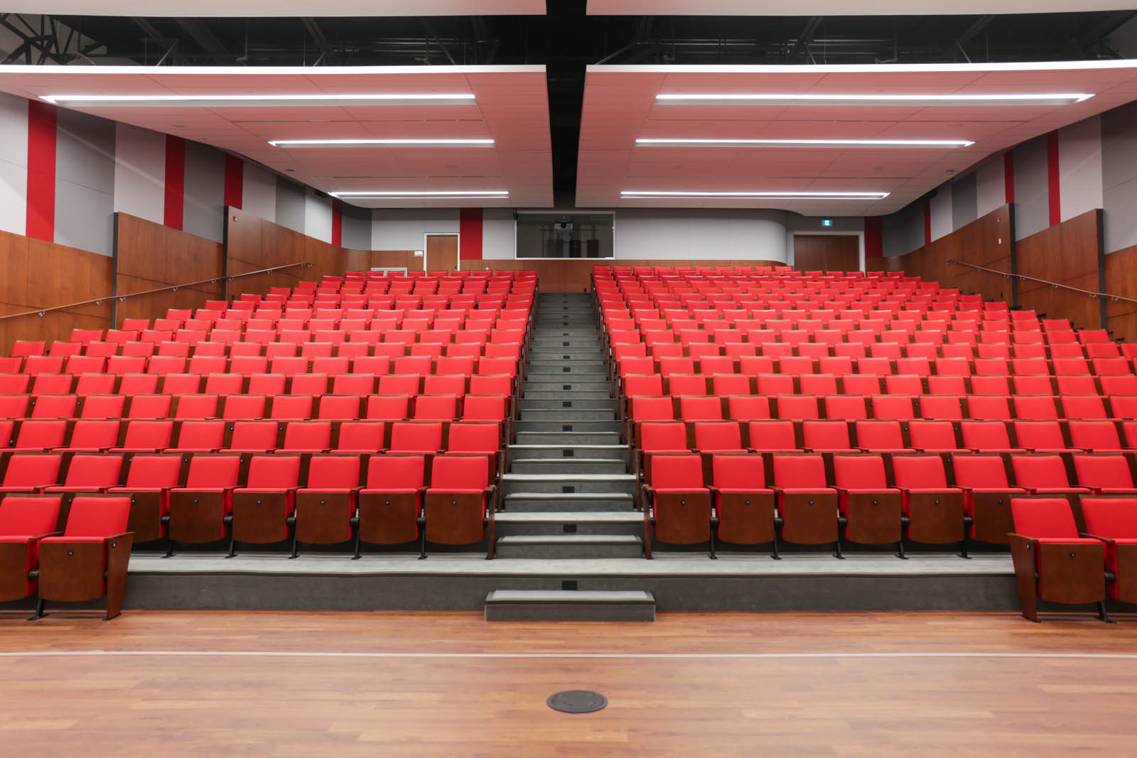 Empty modern 450 seat theatre with bright red seats